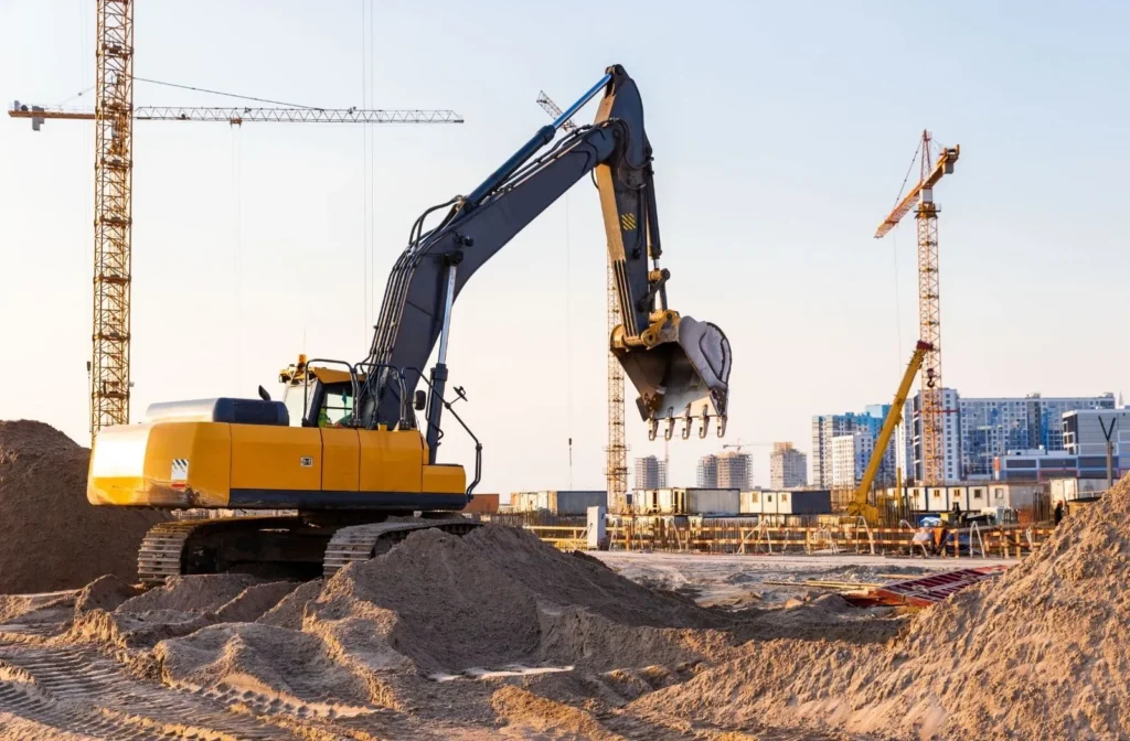 Heavy equipment operating on a construction work front