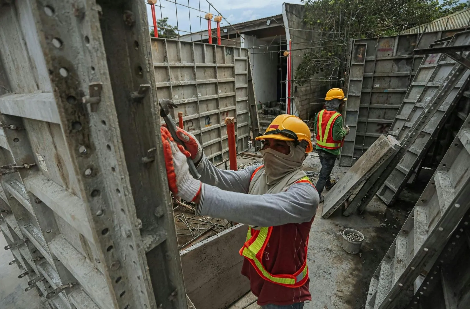Craftsman completing structural formwork on site